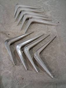 lot 69 image: Shelf Brackets 9 inches White Metal L-Brackets 10-Piece Lot