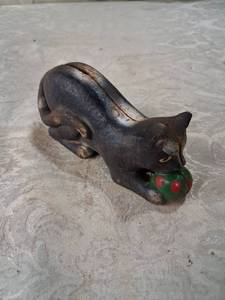 lot 75 image: Carved Cat Figurine with Green and Red Painted Base