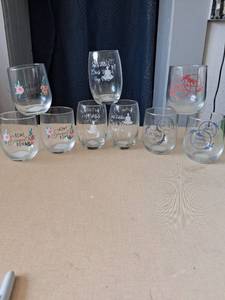 lot 108 image: Lot of 9 Etched Glass Stemless Wine Glasses with Various Designs