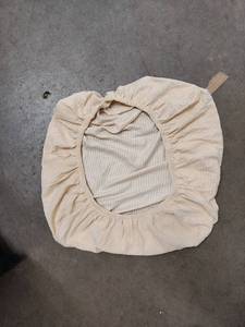 lot 2184 image: Light tan square seat covers approximately 1 ft by one foot
