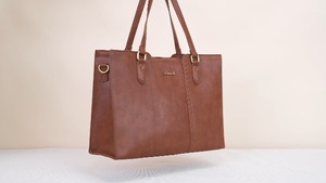 lot 1139 image: Fake leather ladies first brown approximately 16x 12 in