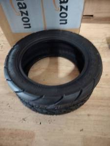 lot 1206 image: Yongjili tubeless max loading 190 kg small black tire