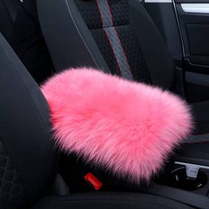 lot 2416 image: Frienda Furry Armrest Cover Auto Center Console Cover Car Soft Console Pad, Real Sheepskin Wool Soft Fluffy Auto Center Armrest Pad for Most Car Decoration Protector(Pink)