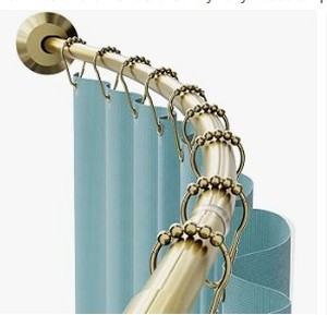 lot 3679 image: Zenith curved gold shower curtain rod