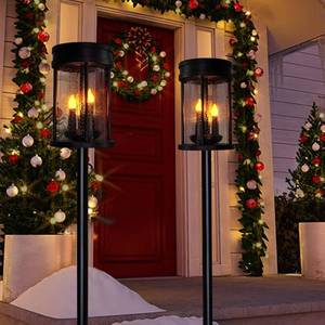 lot 1286 image: Outdoor Garden Solar Stake Lights Flickering Candle Lantern Lighting for Yard, Lawn, Patio, Pathway, Wall Decoration (2Pack, Black)