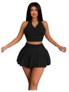 lot 4138 image: RoseSeek Womens 2 Piece Tennis Skirt Set Sleeveless Racerback Crop Tank Tops High Waisted Pleated Mini Skirt Outfits Pure Black Medium