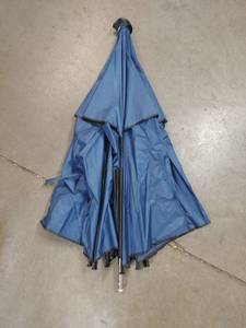 lot 5826 image: Blue Umbrella with Black Shaft and Handle umbrella spands 68 in