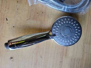 lot 20043 image: Shower Head with Hose and Bracket (Minor Cosmetic Damage)