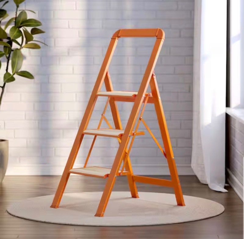 lot 28 image: 3-Step Lightweight Aluminum Step Stool (7 ft. Reach) 450 lb. Load Capacity w Anti-Slip Wide Pedal and Handrails, Orange Retails $97