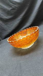 lot 18 image: Marigold Carnival Glass Grape Pattern Bowl