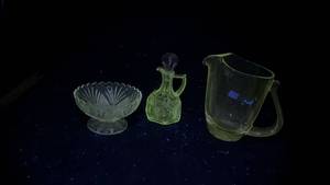 lot 149 image: Clear Glass Dinnerware With Manganese Glow, 3-Piece.