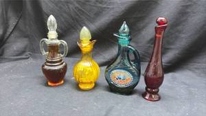 lot 165 image: Avon Fragrance Bottle Lot 4 Decorative Cologne Bottles
