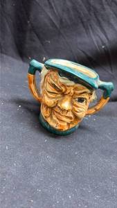 lot 188 image: Character Toby Jug with Teal Glazed Rim and Handles