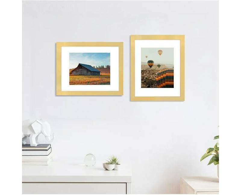 lot 58482 image: Picture Frame Set of 4, High Definition Real Glass, Display Pictures 8x10 with Mat or 11x14 Without Mat, Gallery Wall Hanging Photo Frames, Gold. ONE OPENED AND HAS SCRATCHES ON THE FRAME. - Retail $34