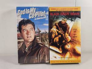 lot 193 image: 2-Film War Drama VHS Lot God Is My Co-Pilot, Black Hawk Down