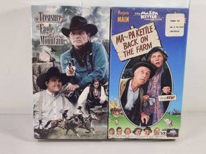 lot 200 image: 2 VHS Tapes The Treasure of Eagle Mountain Ma and Pa Kettle Back on the Farm