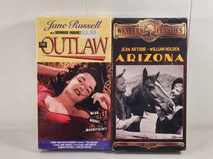 lot 201 image: The Outlaw VHS Jane Russell Howard Hughes  Arizona Western Classics Jean Arthur William Holden 2-Pack