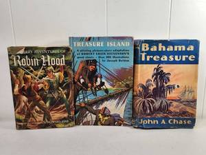 lot 215 image: 3 Classic Adventure Books Robin Hood Treasure Island Bahama Treasure