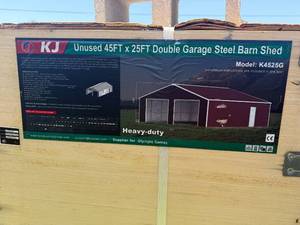 lot 7166 image: Unused KJ Metal 45x25ft Steel Barn Shed (K4525G) Red Brown