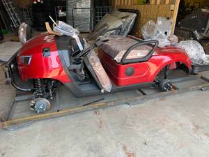 lot 7031A image: Unused 4 Seat Electric Golf Cart GC80- Red - Possibly Bad Batteries, Will Not Accept Charge - Never Driven - selling AS IS
