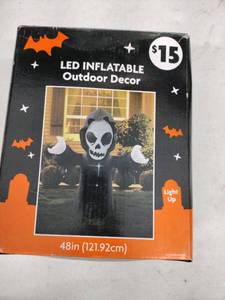 lot 62394 image: LED Inflatable Outdoor Decor Light Up Skeleton - 48 in.