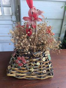 lot 2510 image: Decorative Woven Basket Planter with Dried Flowers and Red Amaryllis