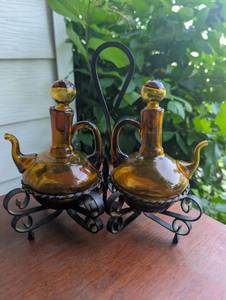 lot 3003 image: Amber Glass Oil and Vinegar Cruet Set with Metal Stand&nbsp