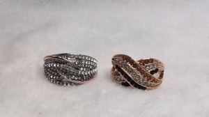 lot 3505 image: Rhinestone Costume Rings Silver Tone Rose Gold Tone Crossover - 2 ct - New