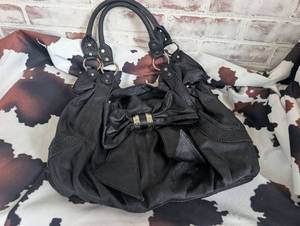 lot 4007 image: Black Shoulder Bag with Dual Handles and Bow Detail
