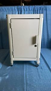 lot 3033 image: White Metal Cabinet with Shelving and Locking Door on Casters