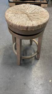 lot 3057 image: Benjara 25 in. Brown Backless Wooden Frame Wood Upholstered Swivel Counter Bar Stool with Seagrass Seat