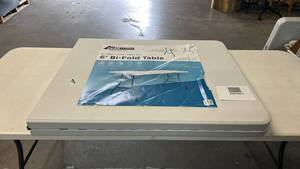 lot 8021 image: Peakform 6 Bi-Fold Table 28 lb