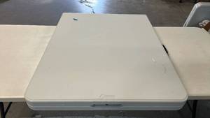 lot 8027 image: Peakform 6 ft Portable Folding Table with Locking Legs, Carrying Handle and Locking Tab for Tabletop.
