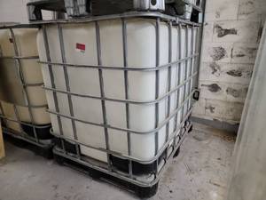lot 16163 image: 275 Gallon IBC Tank With Metal Cage