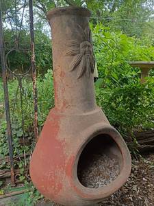lot 1002 image: Chiminea with Sun on top.   52 in. tall
