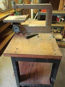lot 1013 image: Work Table with Belt Driven Jig Saw.   With saw 53 x 48 x 24.   Without saw 34 x 48 x 24