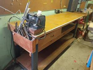 lot 1014 image: Work Bench with Grinder and Vise and a Drawer.   Bench is 36.5 x 90 x 24