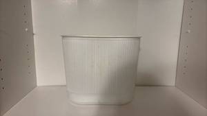 lot 1217 image: White Ribbed Plastic Container