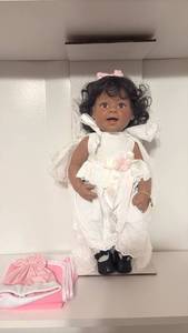 lot 1221 image: Lee Middleton Original Dolls Porcelain Doll Black Hair Pink Bow White Dress
