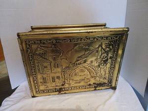 lot 1310 image: Embossed magazine  holder with basket