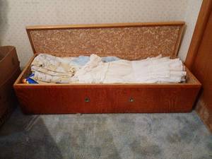 lot 1315 image: 11x48x18 cedar box with lid and vintage baby clothes