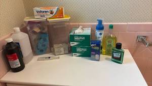 lot 1404 image: Medicine Cabinet Lot Voltaren Pain Relief Kimtech Wipes Hydrogen Peroxide and more