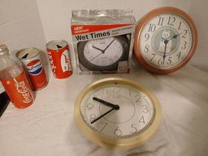 lot 1432 image: IndoorOutdoor Clock, Pepsicoco cola cans and glassbottle and cds