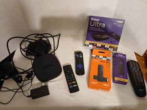 lot 1438 image: Roku Ultra Streaming Player, Amazon Fire TV Stick 4K, Remotes & Accessories Lot