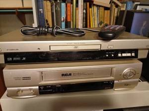 lot 1454 image: RCA AccuSearch Four Head Video System VCR with AV Compu Link XV-S45 DVDCD Player