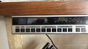 lot 1477 image: General Electric AMFM Clock Radio with Appliance Outlet and Timer