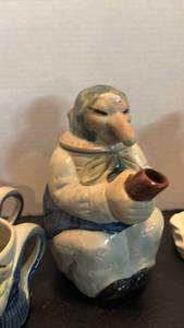 lot 1722 image: Ceramic Witch Teapot with matching mugs and Ceramic Ghost Candlestick holders