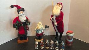 lot 1724 image: Santa Claus Figurines Holiday Decor. Little Santa��s are Metal.