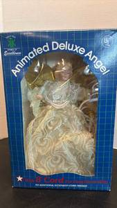 lot 1736 image: GKI Animated Deluxe Angel Tree-Top 10 Light Porcelain Head