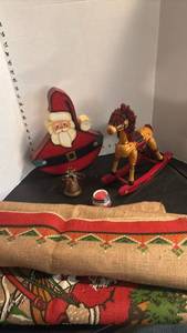 lot 1768 image: Holiday Decorative Figurines Set Santa Rocking Horse Bell 3 Pieces